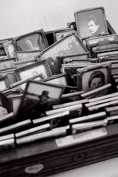 a box full of old photos to be scanned